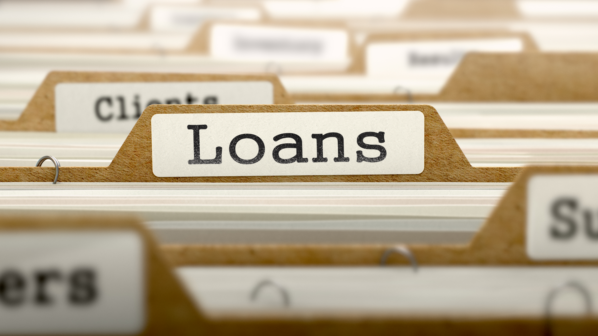 Row of files, one with a tab reading "Loans"