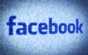 blue facebook logo made of small hexagonal tiles