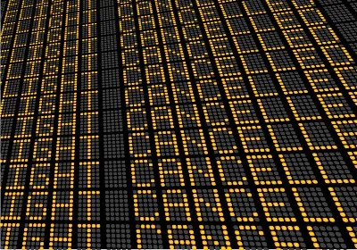 Flight status board shows rows of "flight cancelled"