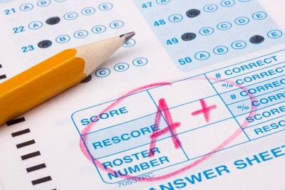 A+ circled in red on an exam sheet - Scotland exam grades