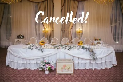 Decorated head table at wedding reception, with word "Cancelled!" - cancelled weddings