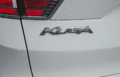 "Kuga" nameplate on white car - Kuga PHEV