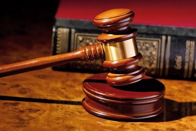 Gavel with law book - Garrick Club