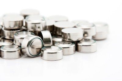 A pile of button cell batteries - baker ross toys