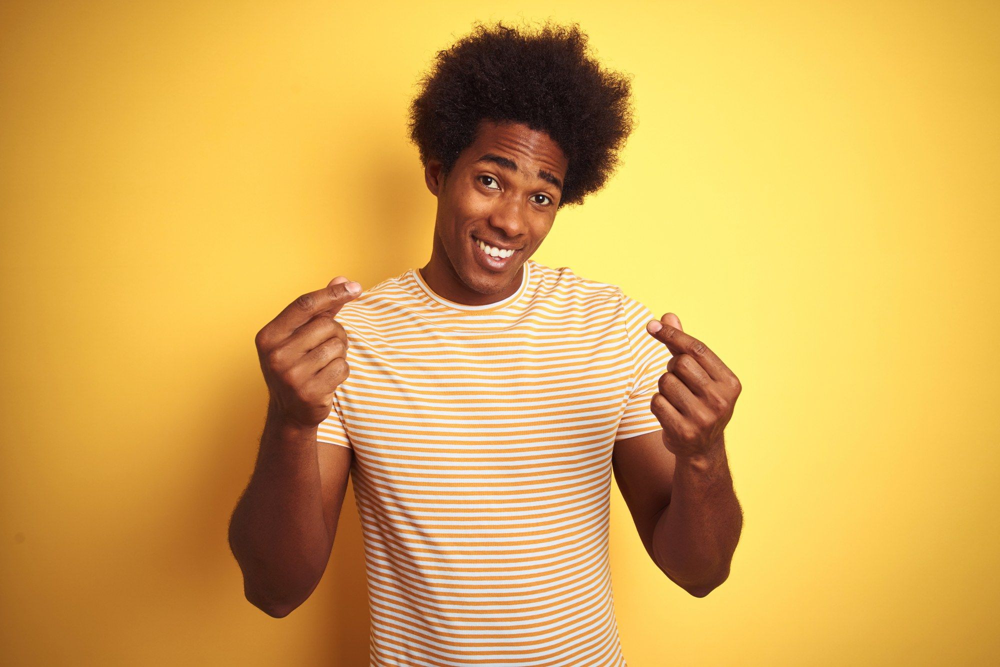 Man making money gesture regarding the Virgin Holidays giving customers refunds