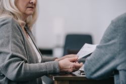 Upset woman regarding the Capita data breach