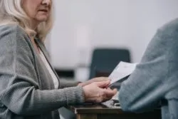 Upset woman regarding the Capita data breach