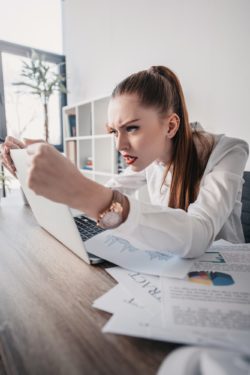 Student upset on laptop regarding the Northumbria University cyberattack