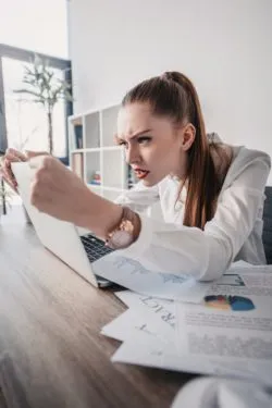 Student upset on laptop regarding the Northumbria University cyberattack