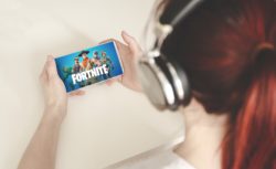 Girl playing fortnite regarding the Epic Games legal action in UK