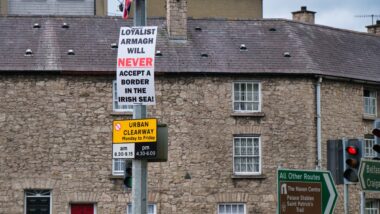 A sign fixed to a lamp post gives the message that the Loyalist people of Armagh do not accept the Northern Ireland Protocol, part of the UK Brexit process