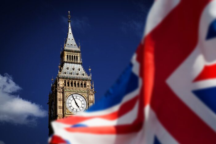 UK flag with Big Ben and House of Parliament in the background