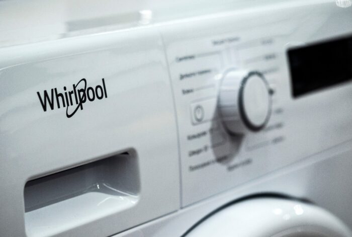 Whirlpool logo on the front of the automatic washing machine
