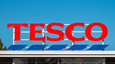 Tesco supermarket sign atop a store exterior