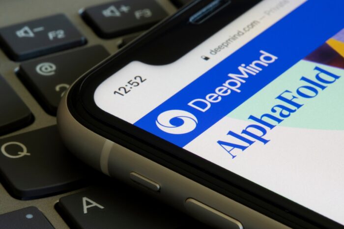 The DeepMind and AlphaFold logos are seen on the DeepMind website.