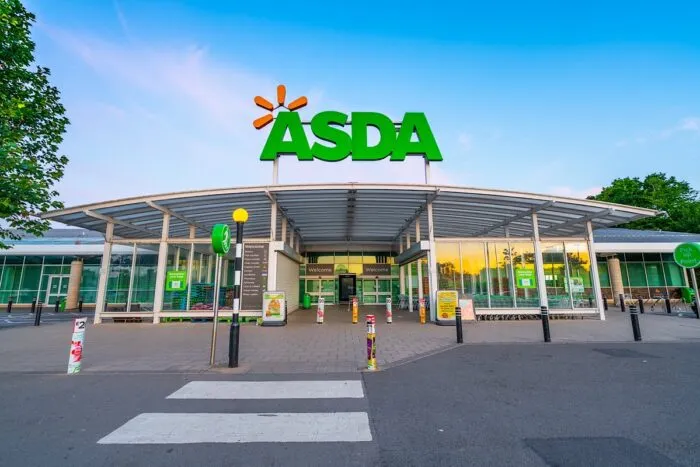 Exterior of a Asda supermarket at sunrise.