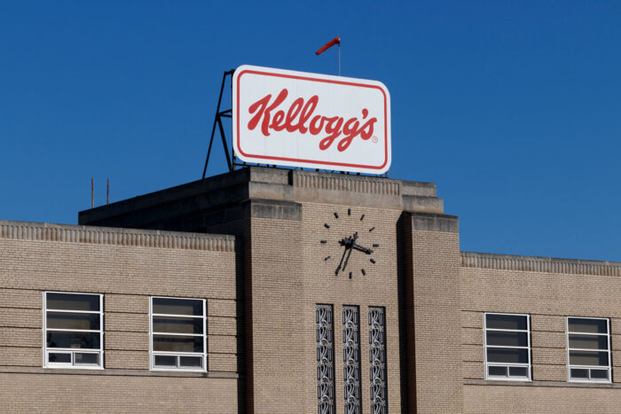 Exterior of a Kellogg's building against a blue sky.