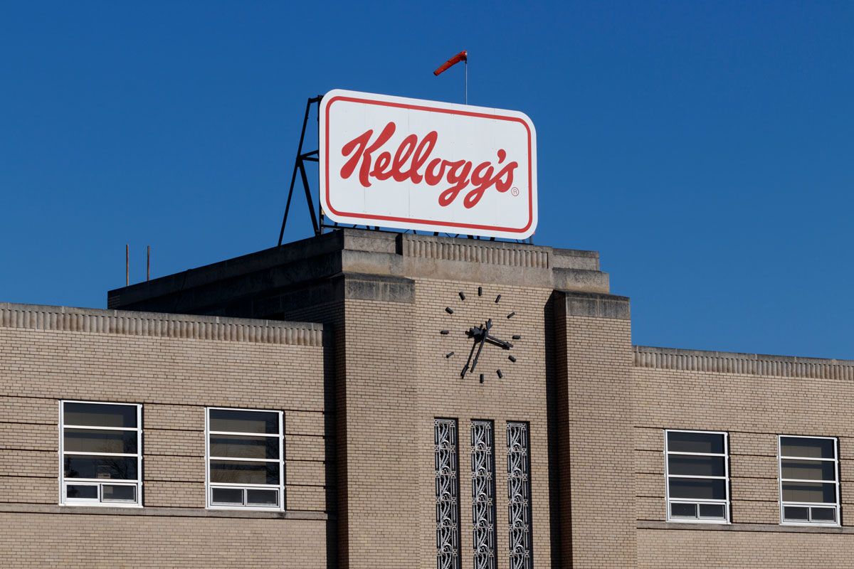 Exterior of a Kellogg's building against a blue sky.