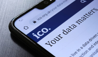 The Information Commissioner's Office ICO website seen on the smartphone corner.