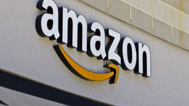 Close up of Amazon signage on exterior of building.