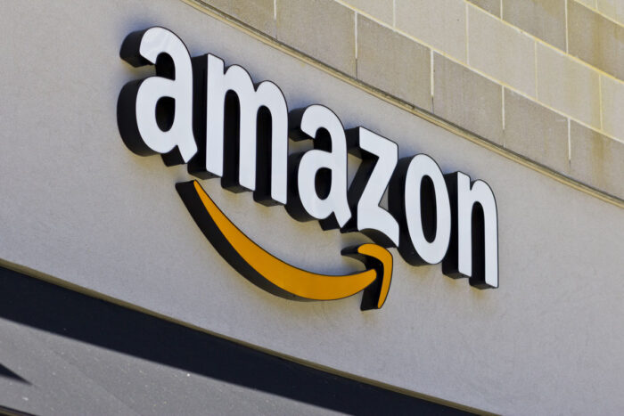 Close up of Amazon signage on exterior of building.