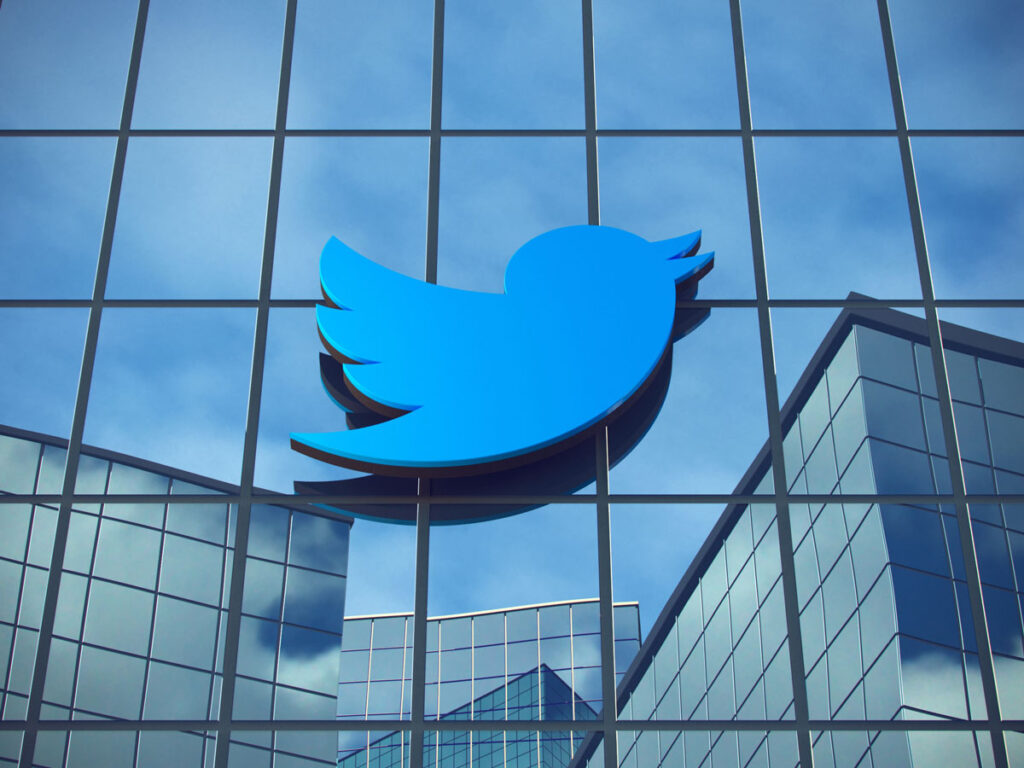 Close up of Twitter logo on the facade of the headquarter office.