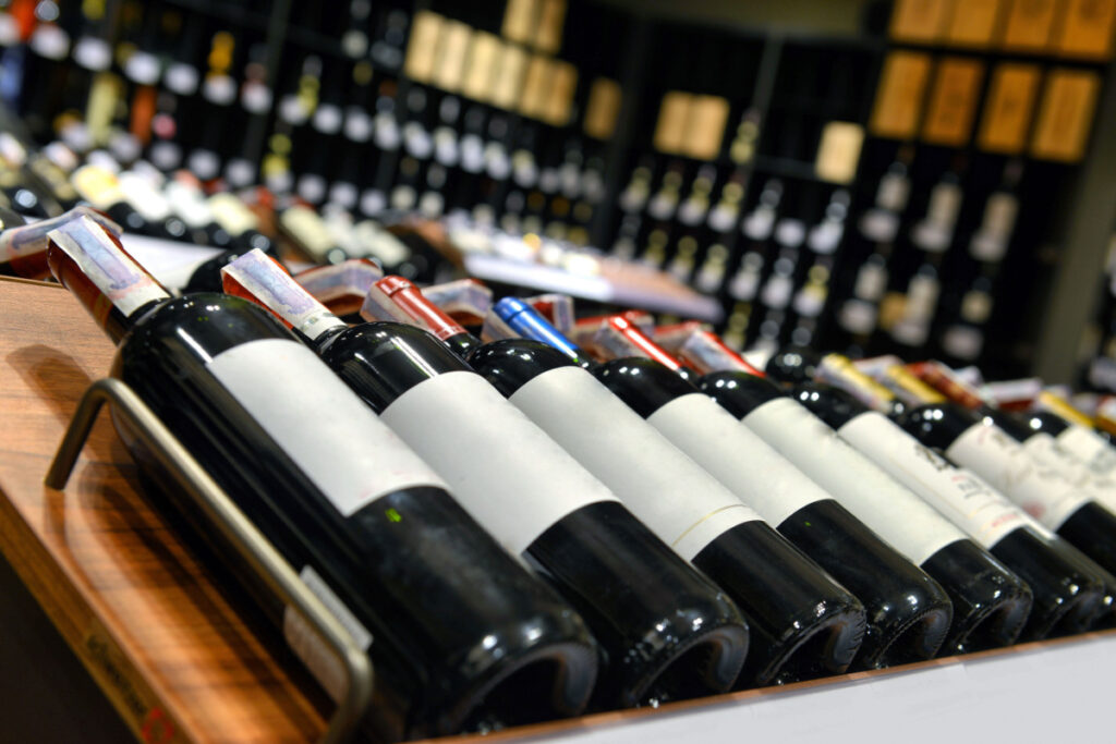 Bottles of wine laying down next to each other