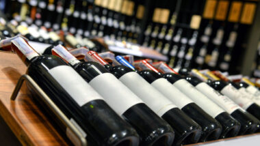 Bottles of wine laying down next to each other