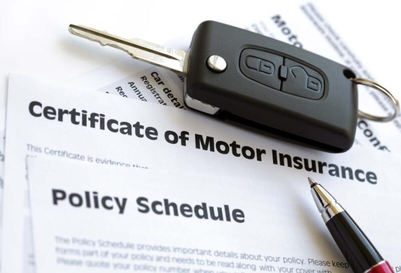 Car keys on top of motor insurance paperwork, representing the motor insurer losses.