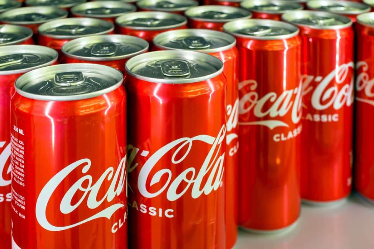Close up of Coca-Cola cans, representing the Coca-Cola recall.